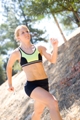 Personal trainer for women - Christa - running in woods.